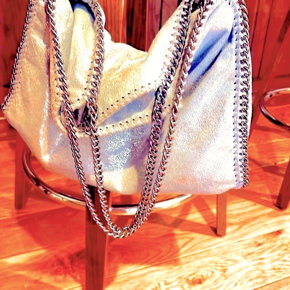 Stella McCartney Handbags - stella Mc Carney like new lg fold over or strap metallic bag